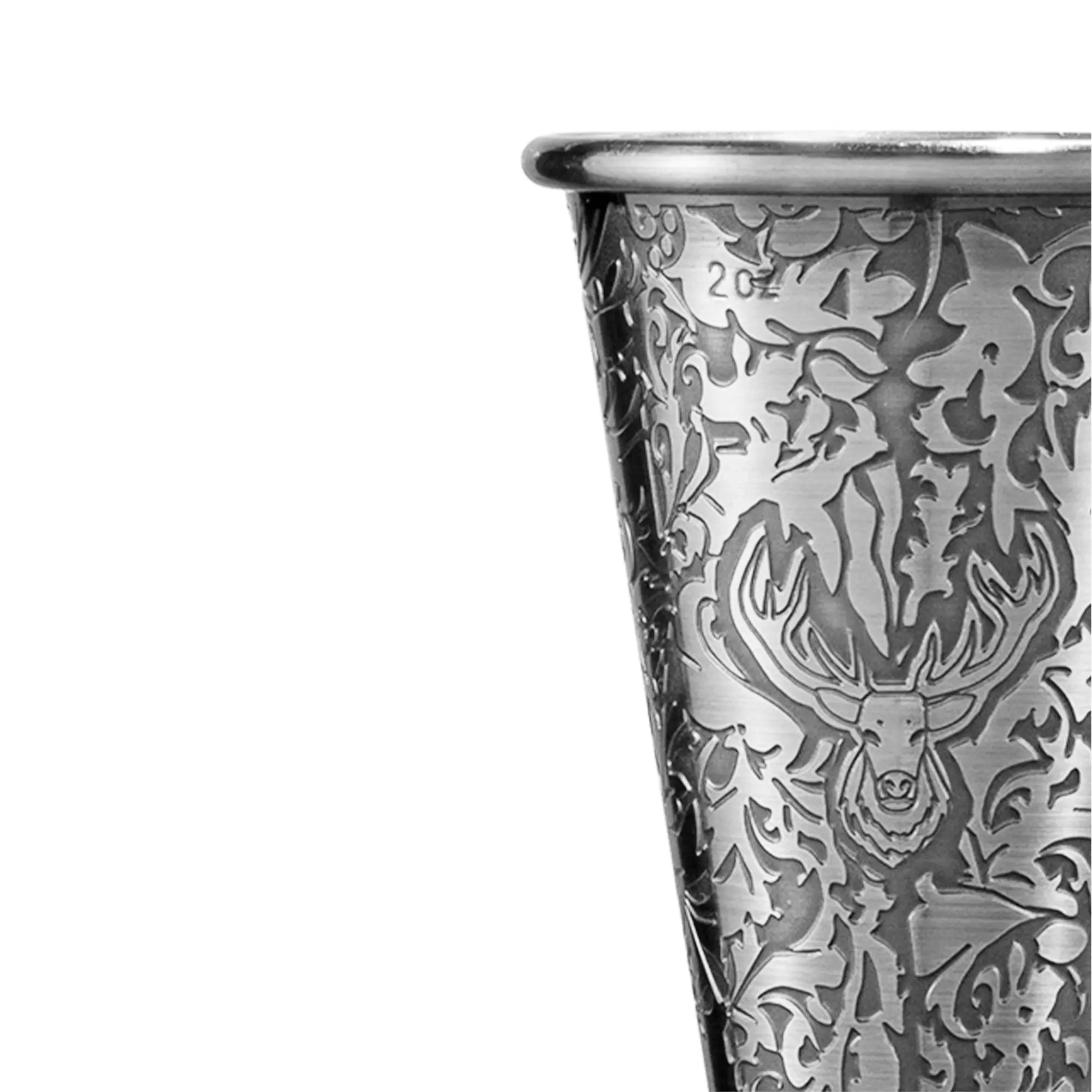 Silver shot glass with deer head design on a white background